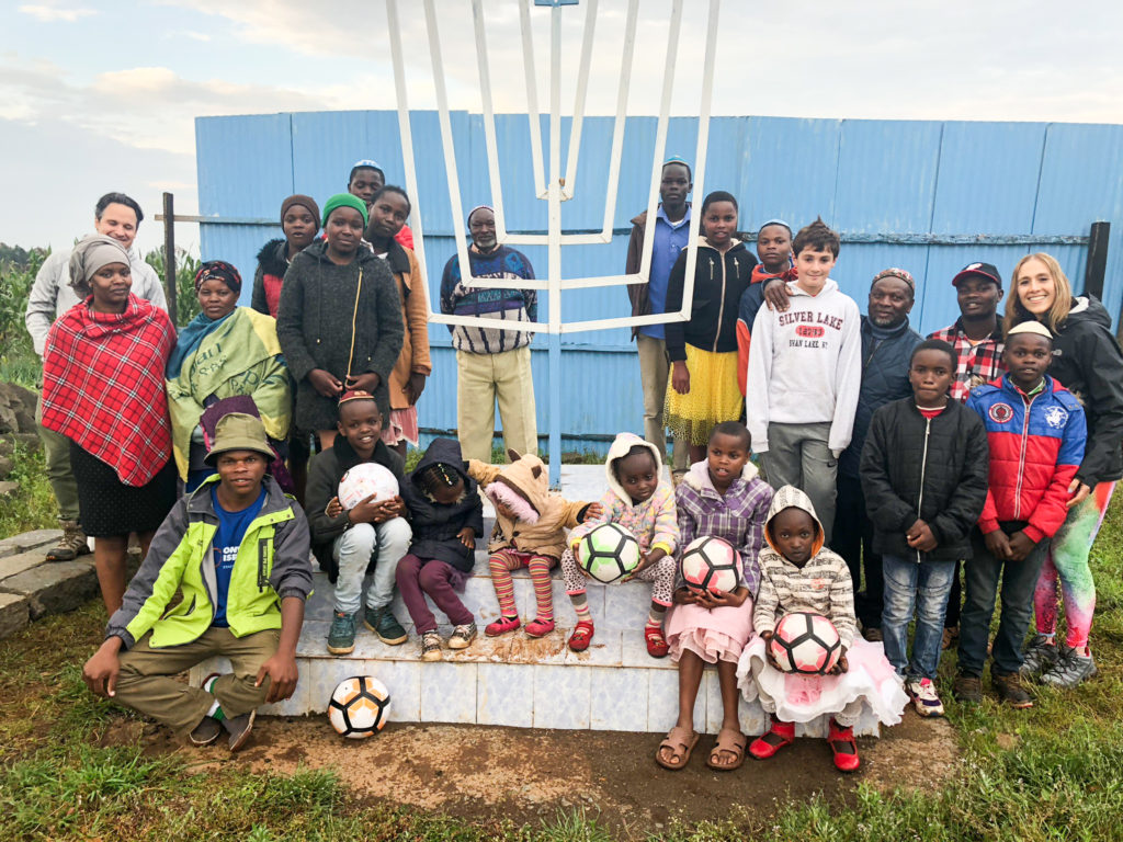 Bar mitzvah student Wyatt and his family at Kehillat Kasuku in Kenya