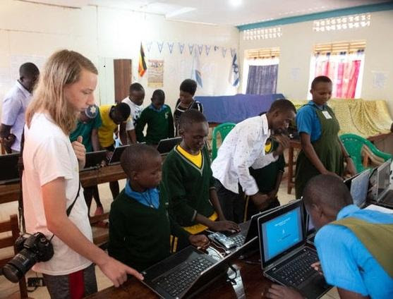 Computer coding class at Hadassah School in Uganda led by bar mitzvah student Logan
